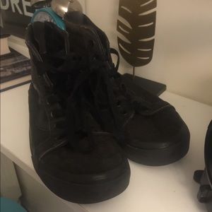 Black vans (it goes up to your ankles)